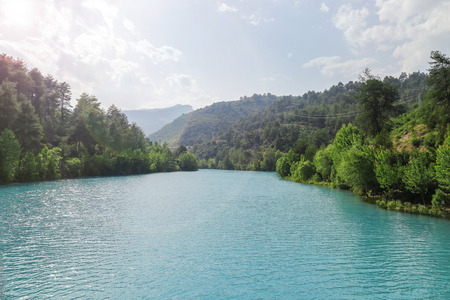The beautiful  blue lake in Turkey. And there is sun.の写真素材