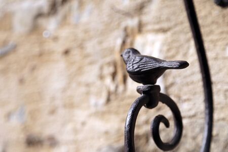 The decoration sparrow at the door in village.の写真素材