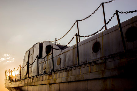 The old rusty battleship with blue sky.の写真素材