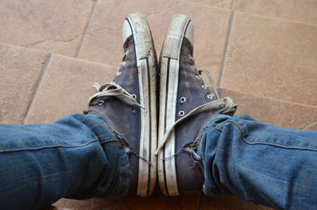 Old dirt sneakersの写真素材