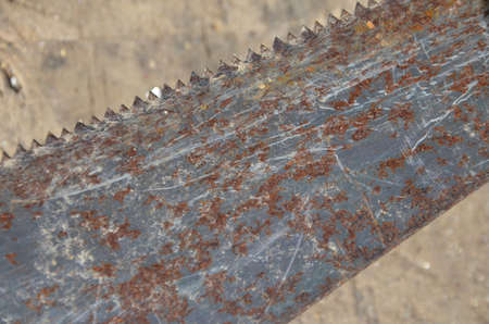 Rusty hand sawの写真素材