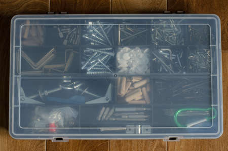 Black plastic box with screwsの写真素材