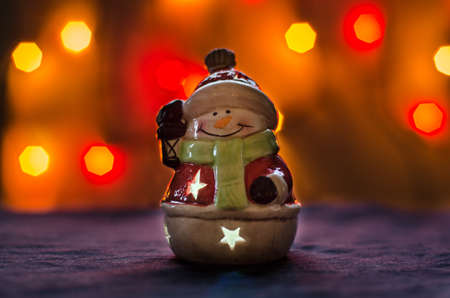 xmas christmas snowman bokeh red lightsの写真素材