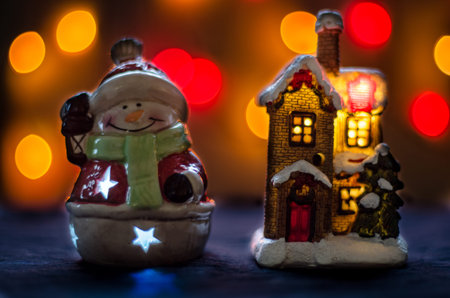 xmas christmas snowman bokeh red lightsの写真素材