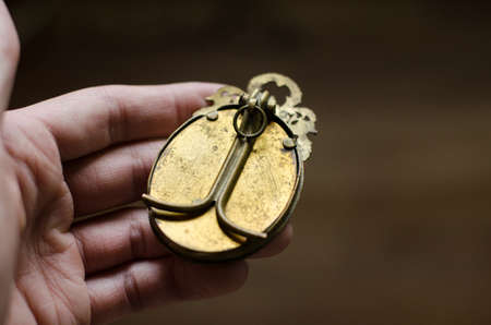 Vintage metal bronze photo frame with grandmother photoの写真素材