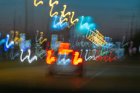 Out of focus lights of a street at night