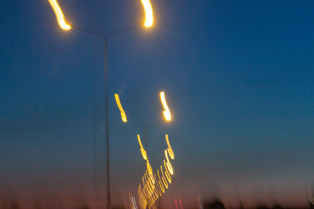 Out of focus lights of a street at night