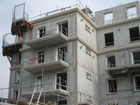 Apartment building under constructionの写真素材