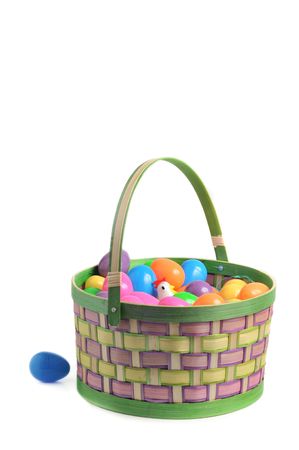 Easter basket with colored eggs,grass and henの写真素材