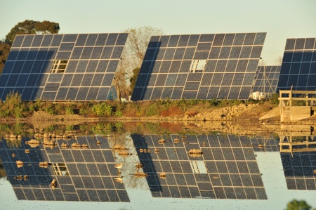 Solar Panel in a field with blue sky.の写真素材