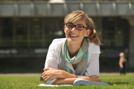 Female beautiful student on campusの写真素材