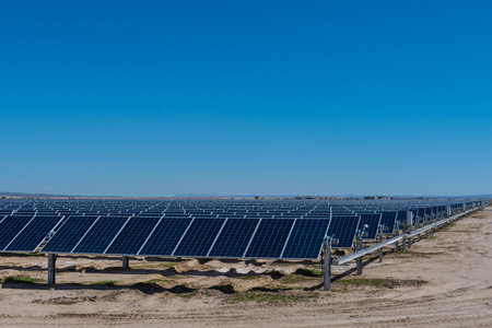 Many wind machines in the desert with blue sky