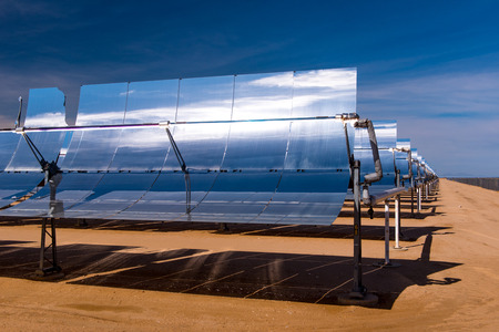 Rows of solar powered heat generators in the desertの写真素材