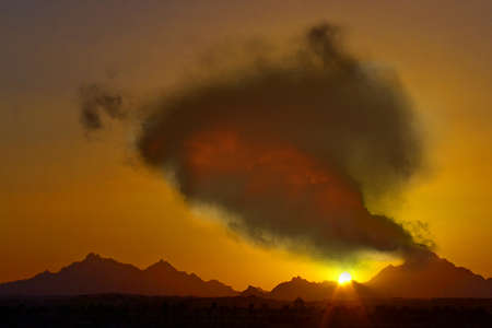 Illustration of a volcano at sunset.の写真素材