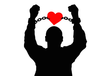 Silhouette of a man in the chains of love.の写真素材