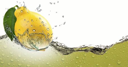Ripe citrus lemon,amid a spray of juice.の写真素材