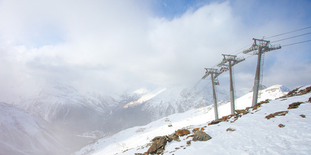 Cableway in the mountains ski resort in the winter.の写真素材