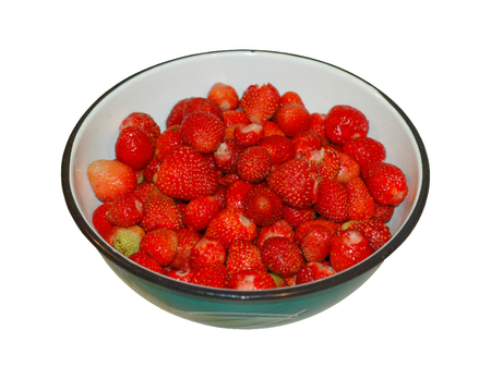 Ripe berries of wild strawberry in a cup.の写真素材
