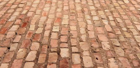 The wall is lined with building bricks. The background texture.の写真素材