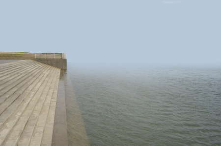 The staircase is outgoing to the sea. The coastal strip.の写真素材