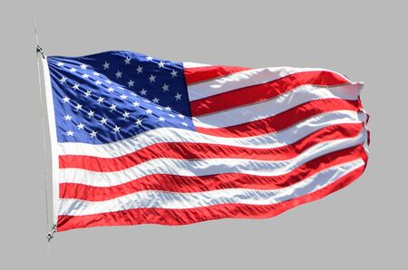 American developing flag on an isolated gray background.の写真素材