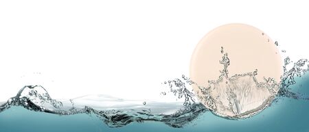 Cream toilet soap in spray of water.の写真素材