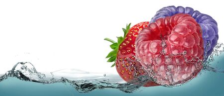 Strawberries, raspberries, blackberries. Ripe wild berry drink.の写真素材