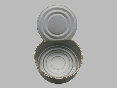 Empty, open with a key round tin can of metal tin.の写真素材