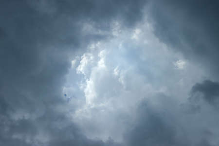 An open portal in the clouds to another dimension.の写真素材