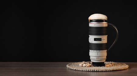 A mug of beer in a Canon lens image.の写真素材