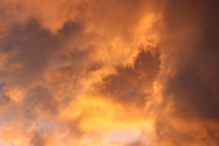 Sky with mystical and scary clouds at sunrise.の写真素材