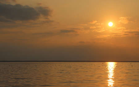 Sunset on the bay during a calm period.の写真素材