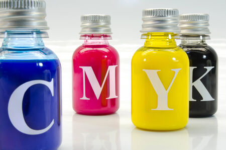 small bottles with the four basic printing colorsの写真素材