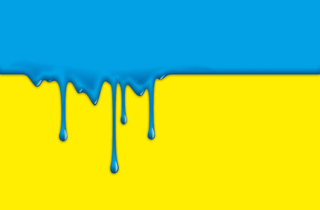 viscid paint runs down a yellow surfaceの写真素材