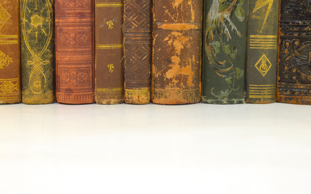 closeup of old books from an antiquarian bookshop with lensの写真素材