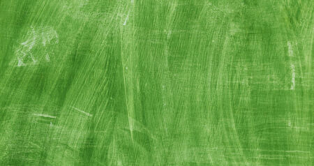 closeup of old blackboard with residues of chalkの写真素材