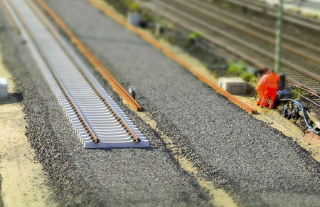 assembly of rails on a recently constructed embankmentの写真素材