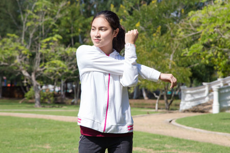 healthy young woman stretching before Fitness and Exercise