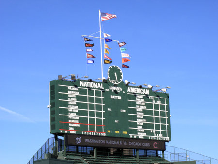 Chicago, Illinois - April 26, 2010: Famous Wrigley Field scoreboard and bleachers before a Cubs game against the Washington Nationalsのeditorial素材