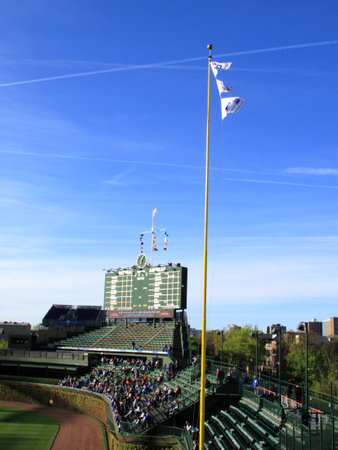 Chicago, Illinois - April 26, 2010: Famous Wrigley Field scoreboard, ivy and bleachers before a Chicago Cubs game against the Washington Nationals のeditorial素材