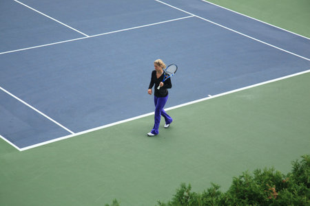 New York - September 9, 2010: Kim Clijsters, 2010 U. Open Women's Singles champion, on the practice court a few days before the final match.のeditorial素材