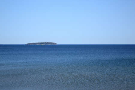 Lake Superior - Blue waters and island of a North American Great Lake.の写真素材
