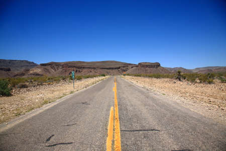 Desert Landscape - Road heads into the Black Mountains of Arizona in the American Southwest.の写真素材