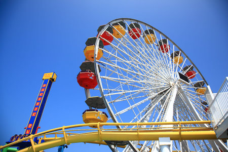 Santa Monica, California - July 1, 2012: Pacific Park ferris wheel on the Santa Monica pier.