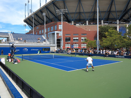 Flushing, New York - September 3, 2014: Side courts adjacent to towering Arther Ashe Stadium during the 2014 US Open Tennis Championships.のeditorial素材