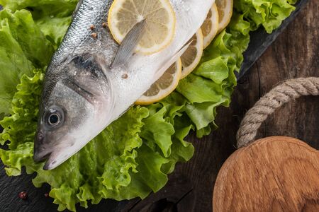 Raw fresh fish on the cutting boardの写真素材