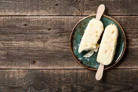 Peach ice cream on a plateの写真素材