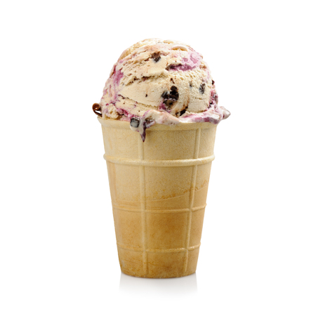 Ice cream with blueberries and chocolate in wafer cup on white backgroundの写真素材