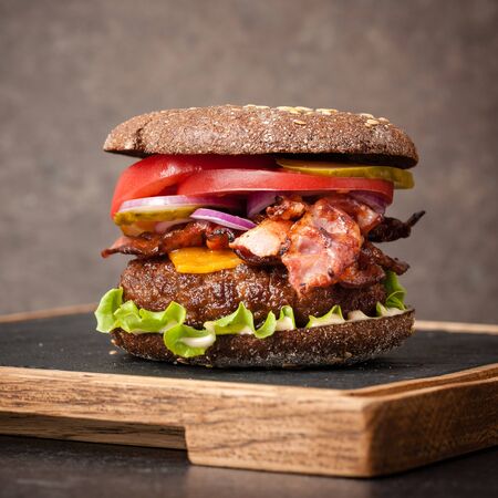 Burger on serving boardの写真素材