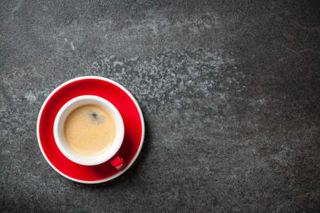 Cup of coffee on black backgroundの写真素材